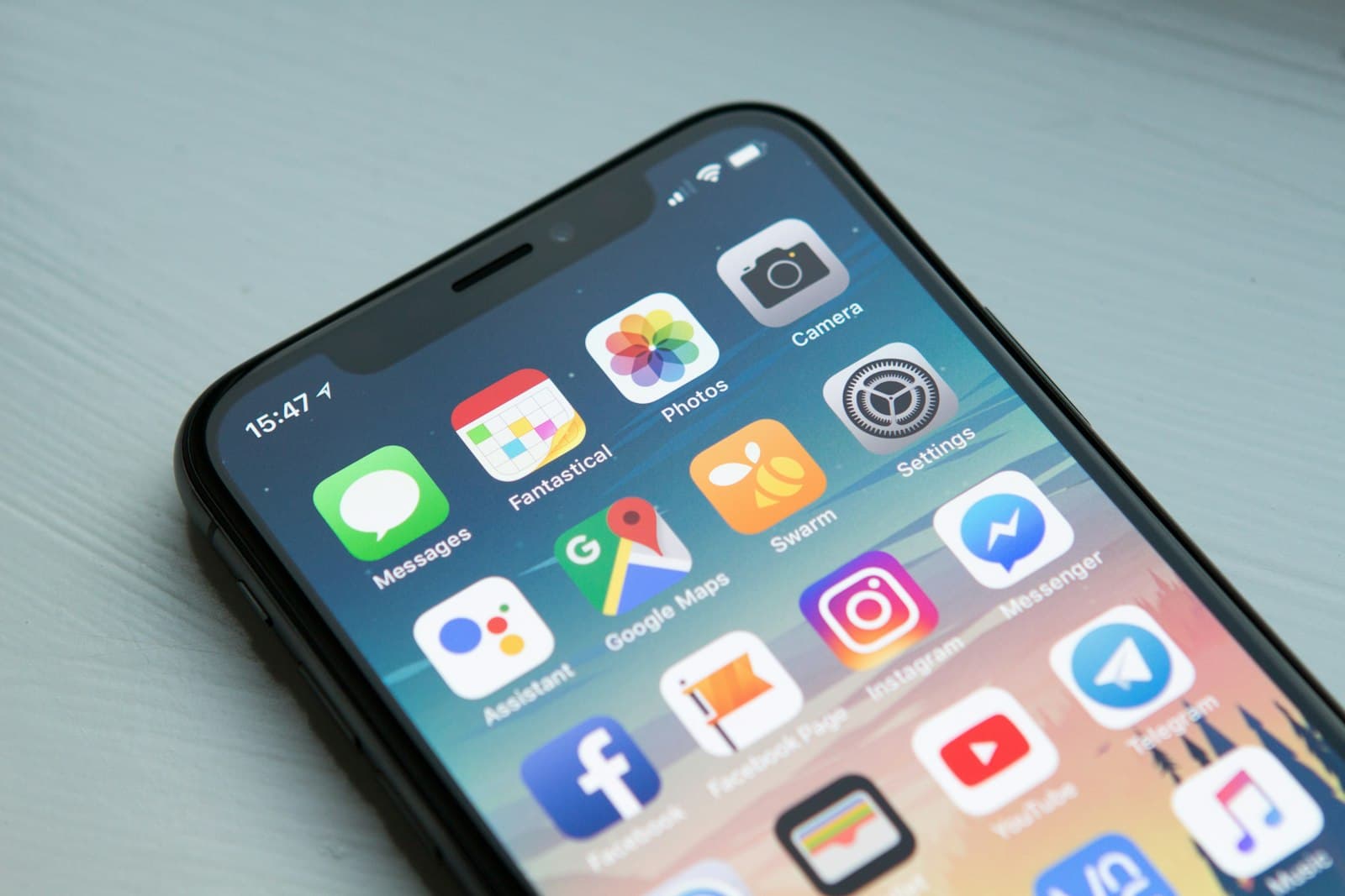Person holding a smartphone for vertical social video content